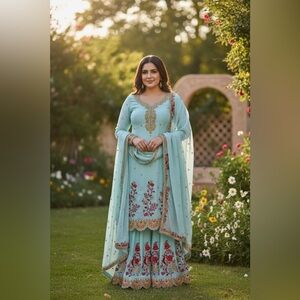 Elegant Embroidered Suit with Red Floral Design